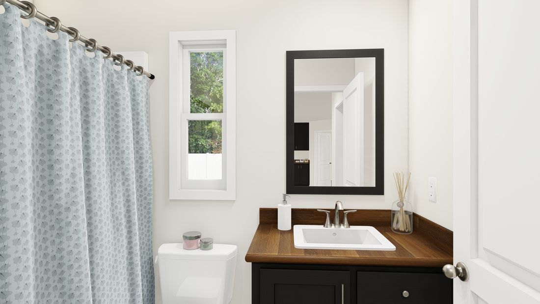 The DRM483F 48' DREAM Guest Bathroom. This Manufactured Mobile Home features 3 bedrooms and 2 baths.