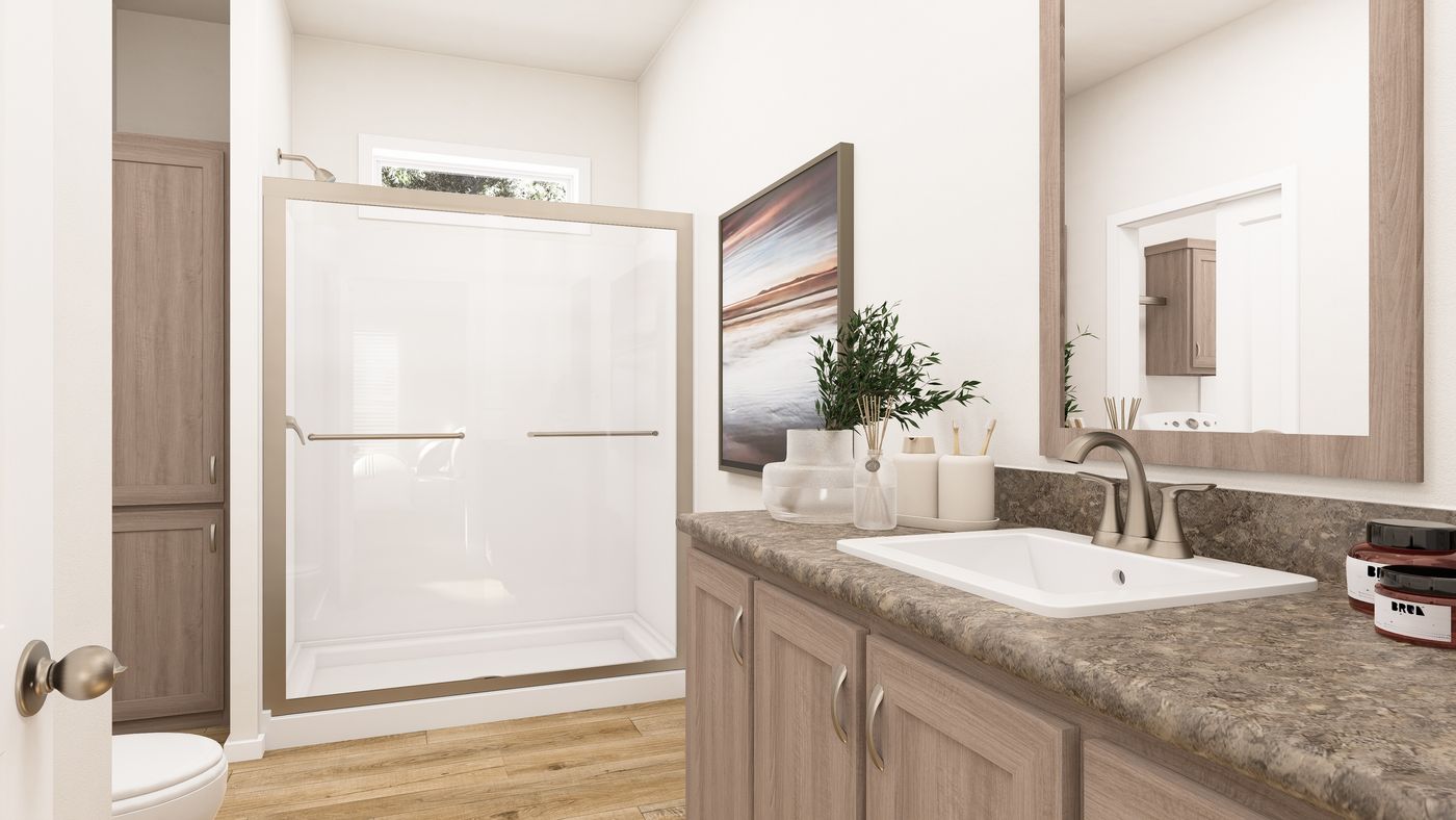 The PREFERRED PLUS CP561F Primary Bathroom. This Manufactured Mobile Home features 3 bedrooms and 2 baths.