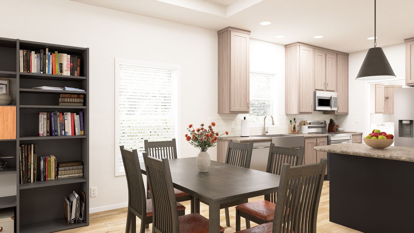 The PREFERRED PLUS CP561F Dining Room. This Manufactured Mobile Home features 3 bedrooms and 2 baths.
