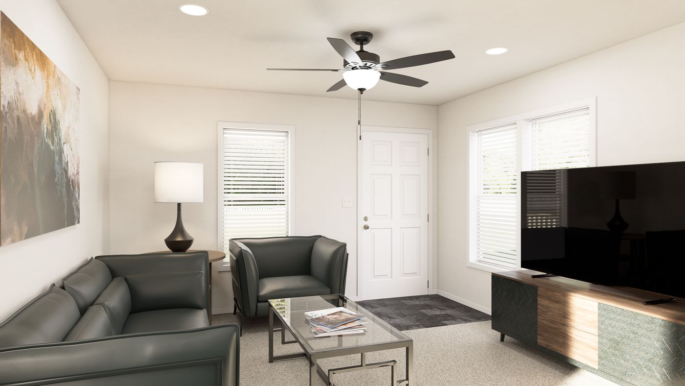 The DRM521M 52' DREAM Living Room. This Manufactured Mobile Home features 2 bedrooms and 1 bath.