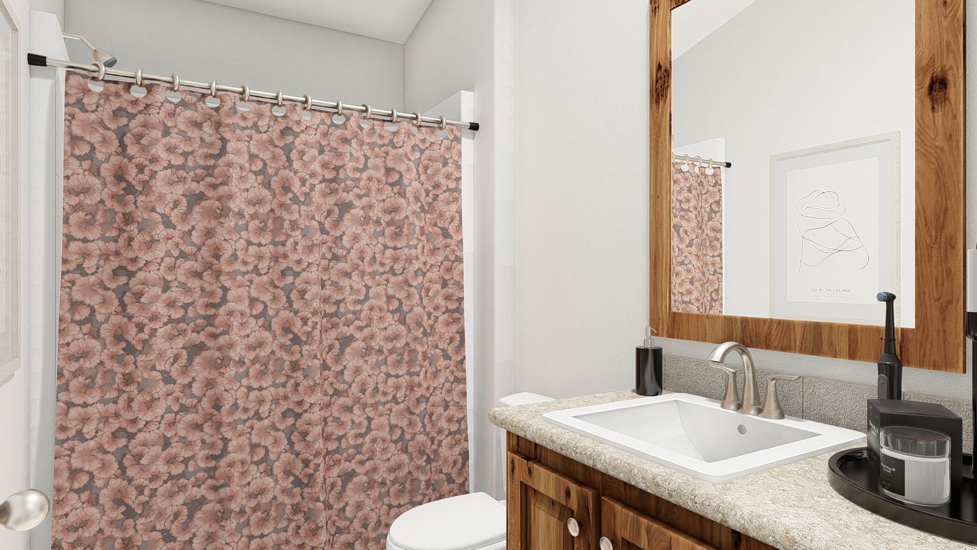 The QL604K                 CLAYTON Guest Bathroom. This Manufactured Mobile Home features 4 bedrooms and 2 baths.